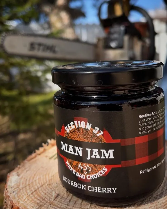 macro photo of jar of "man jam" in market setting