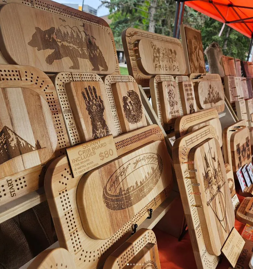 wood-crafted games on display for christmas market